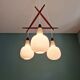 Scandinavian chandelier in teak and white opaline, 1960s