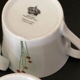 4 fine white porcelain cups with fine flower decoration