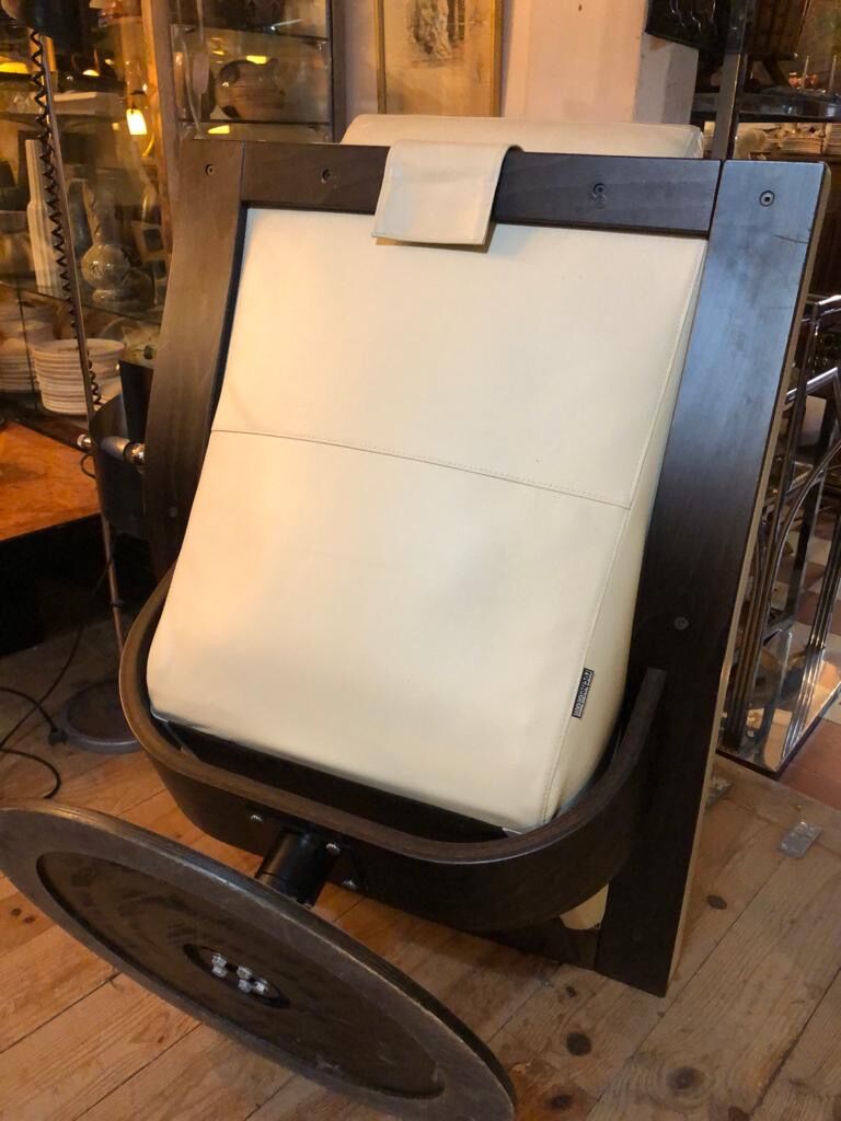 White leather armchair and ottoman