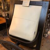 White leather armchair and ottoman