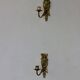 Pair of mid-century Swedish brass face motif sconces