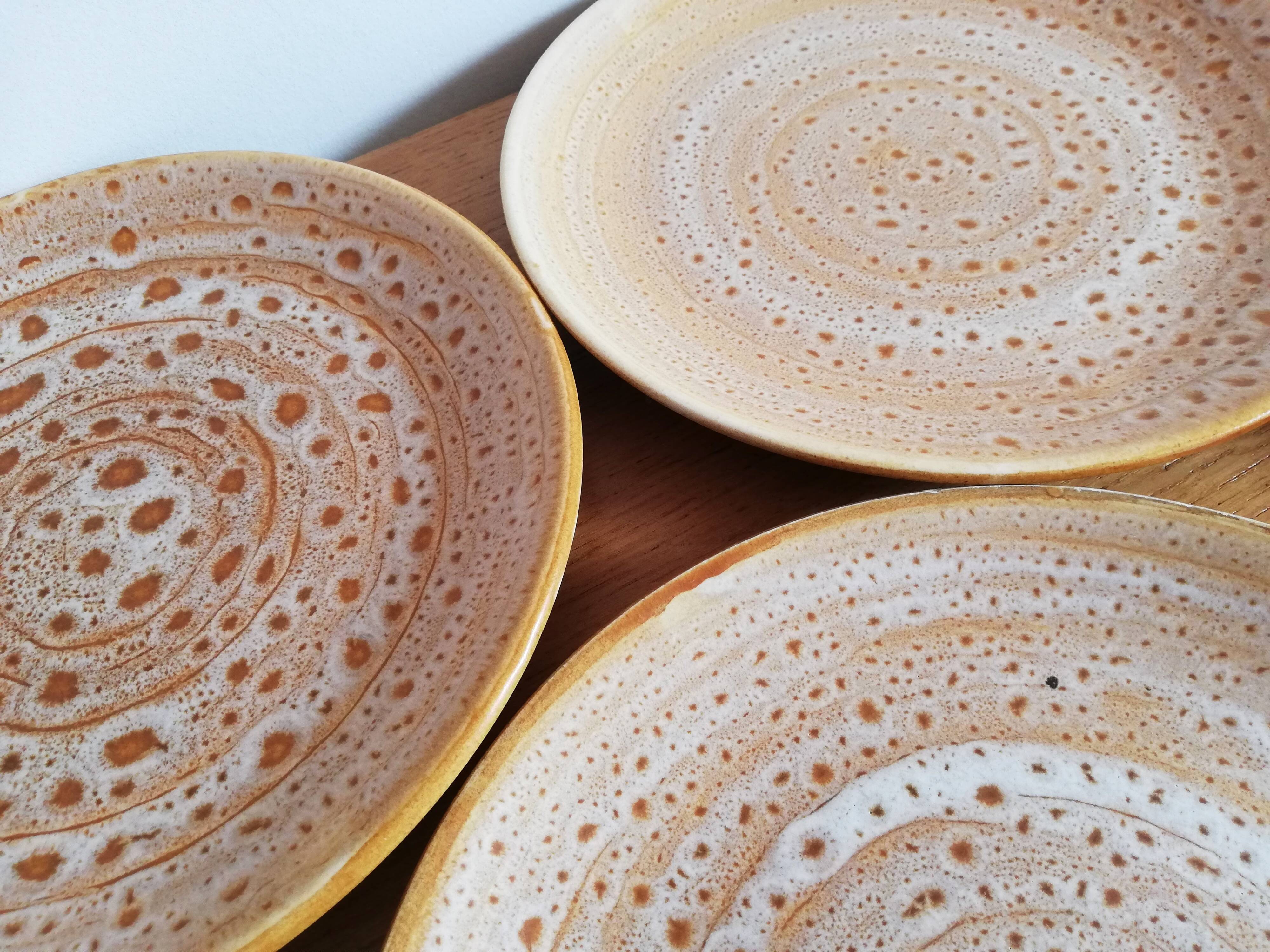 8 Niderviller Fauve dinner plates