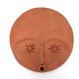 Round ceramic wall mask inspired by Africa, 1980s.