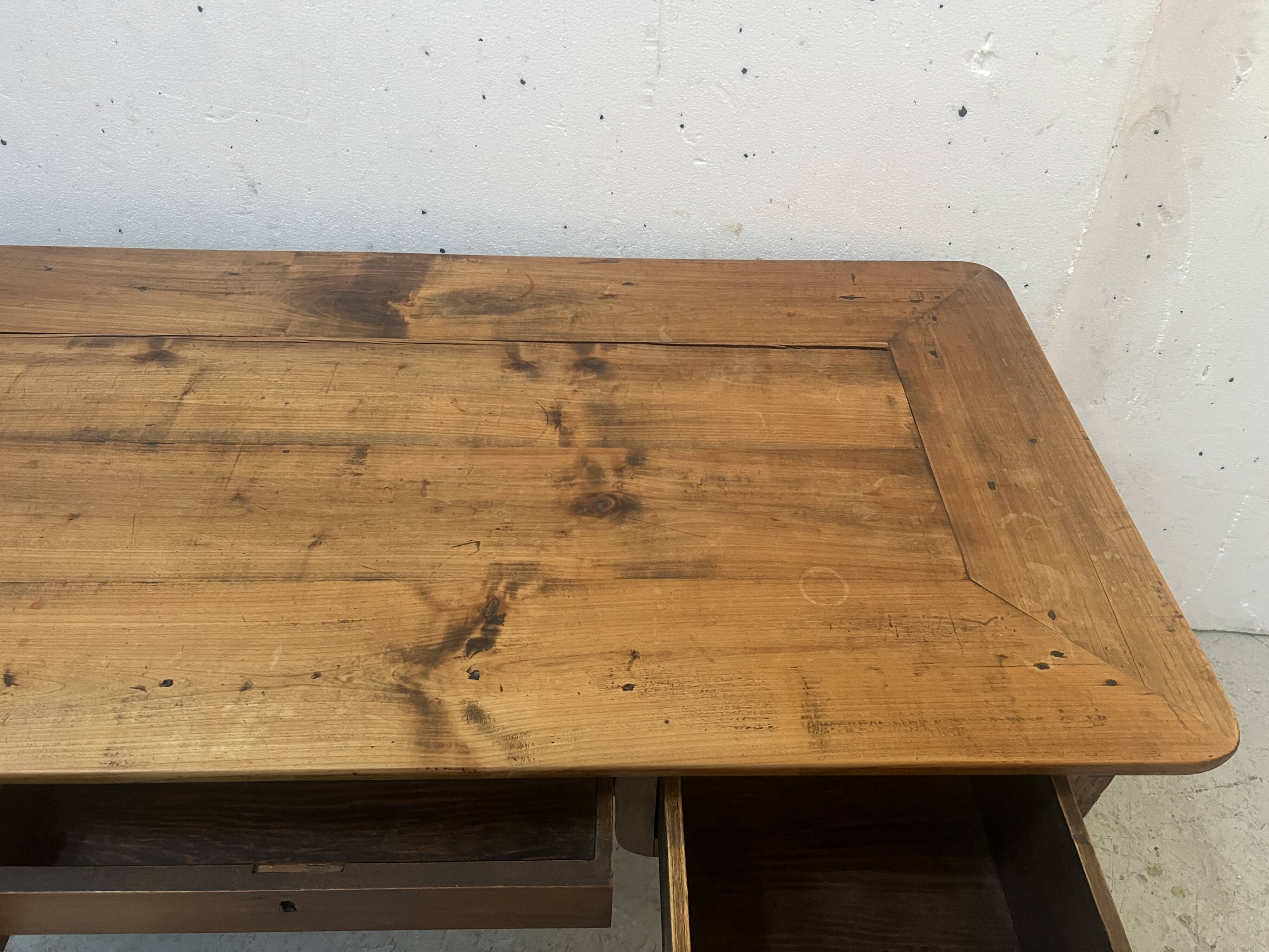 Provincial desk made of solid cherry wood, 20th century.