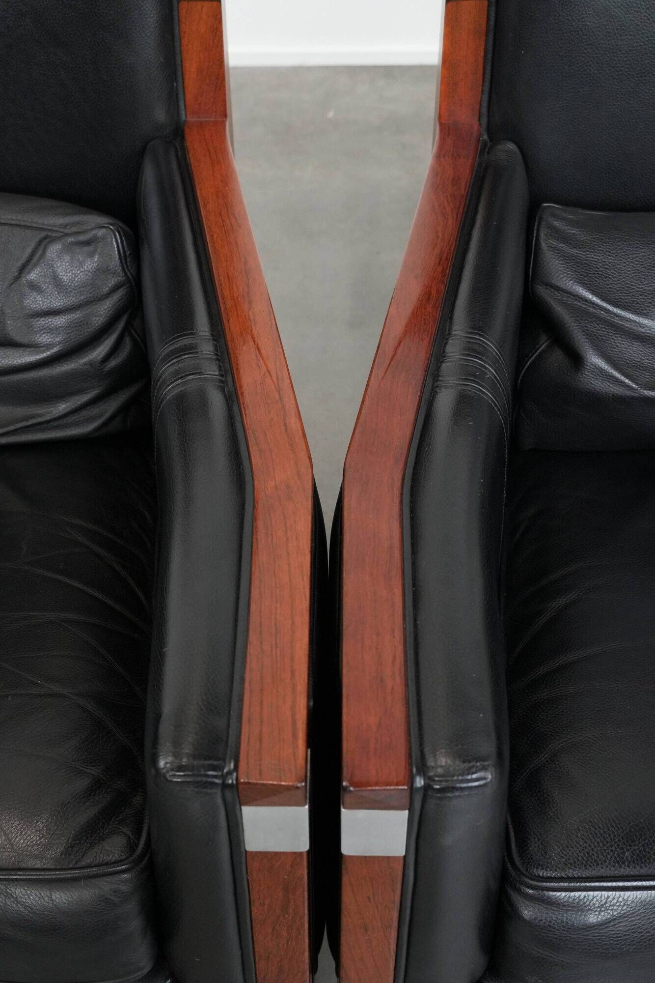 Beautiful set of 2 black cow leather Art Deco design armchairs with high back