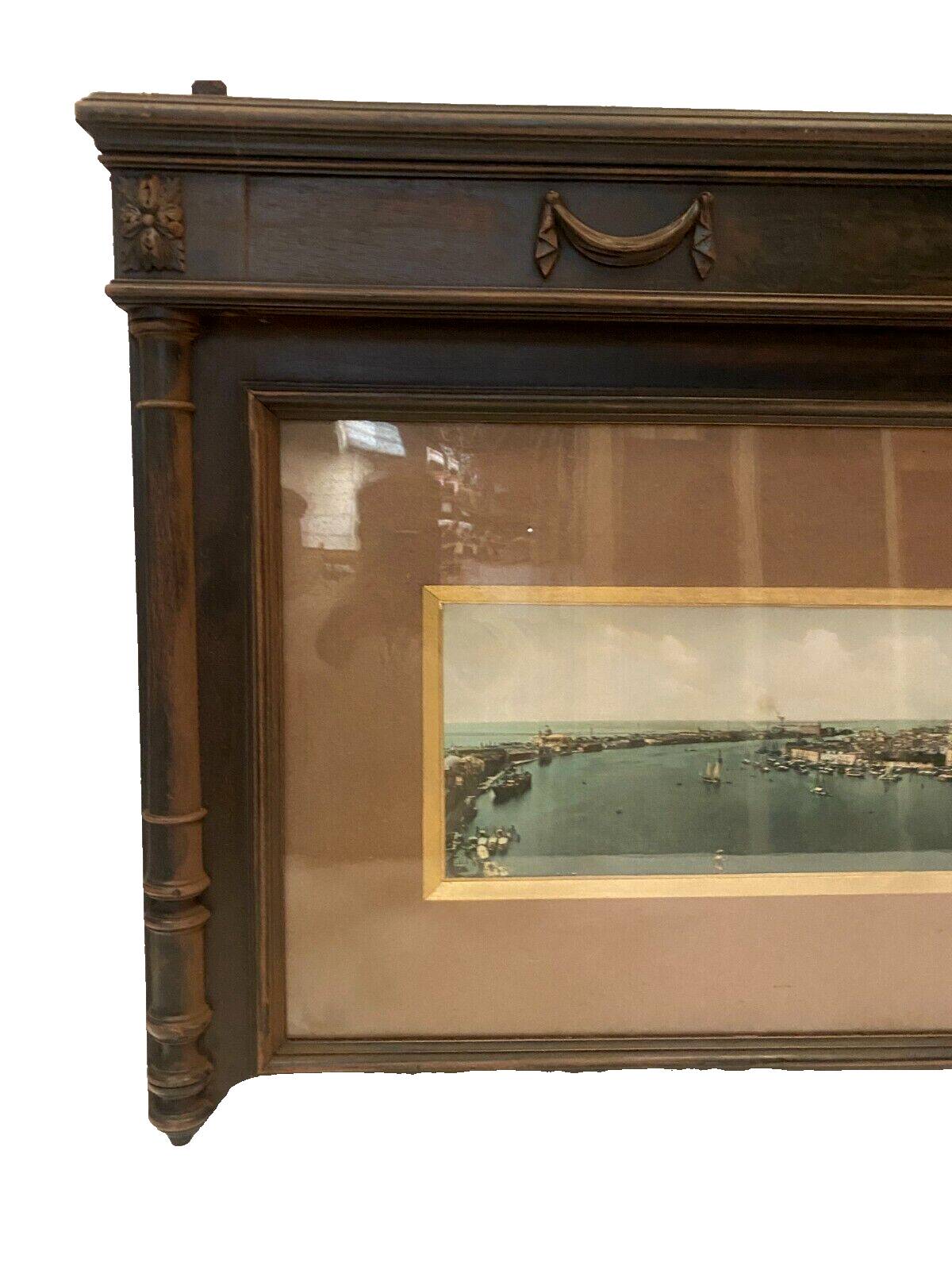 Panoramic view of Venice in a 20th century carved walnut frame