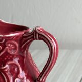 Red ceramic milk jug