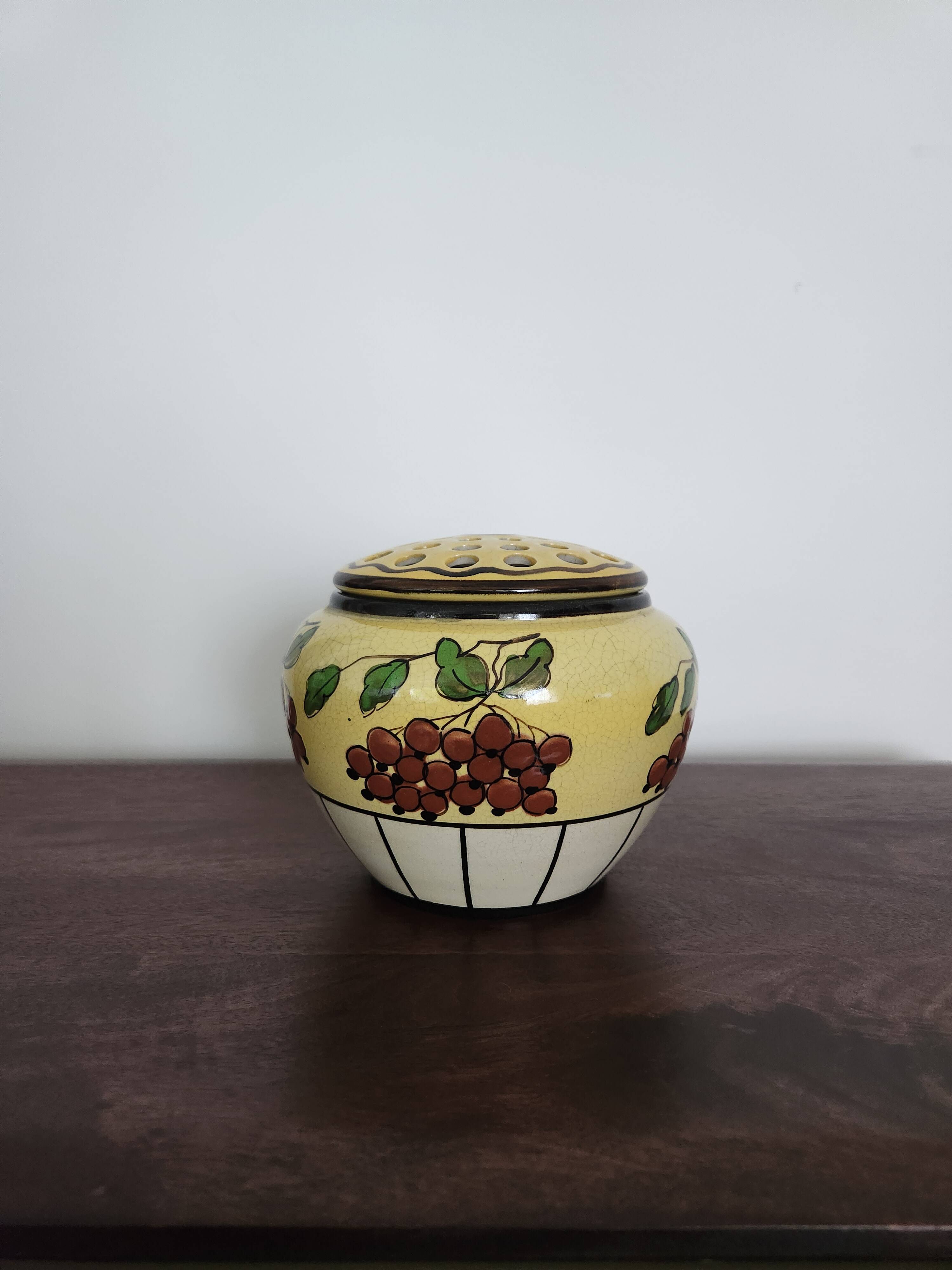 Pique fleur ancien en faïence de Belgique