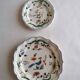 2 earthenware plates from Gien, paradise birds.