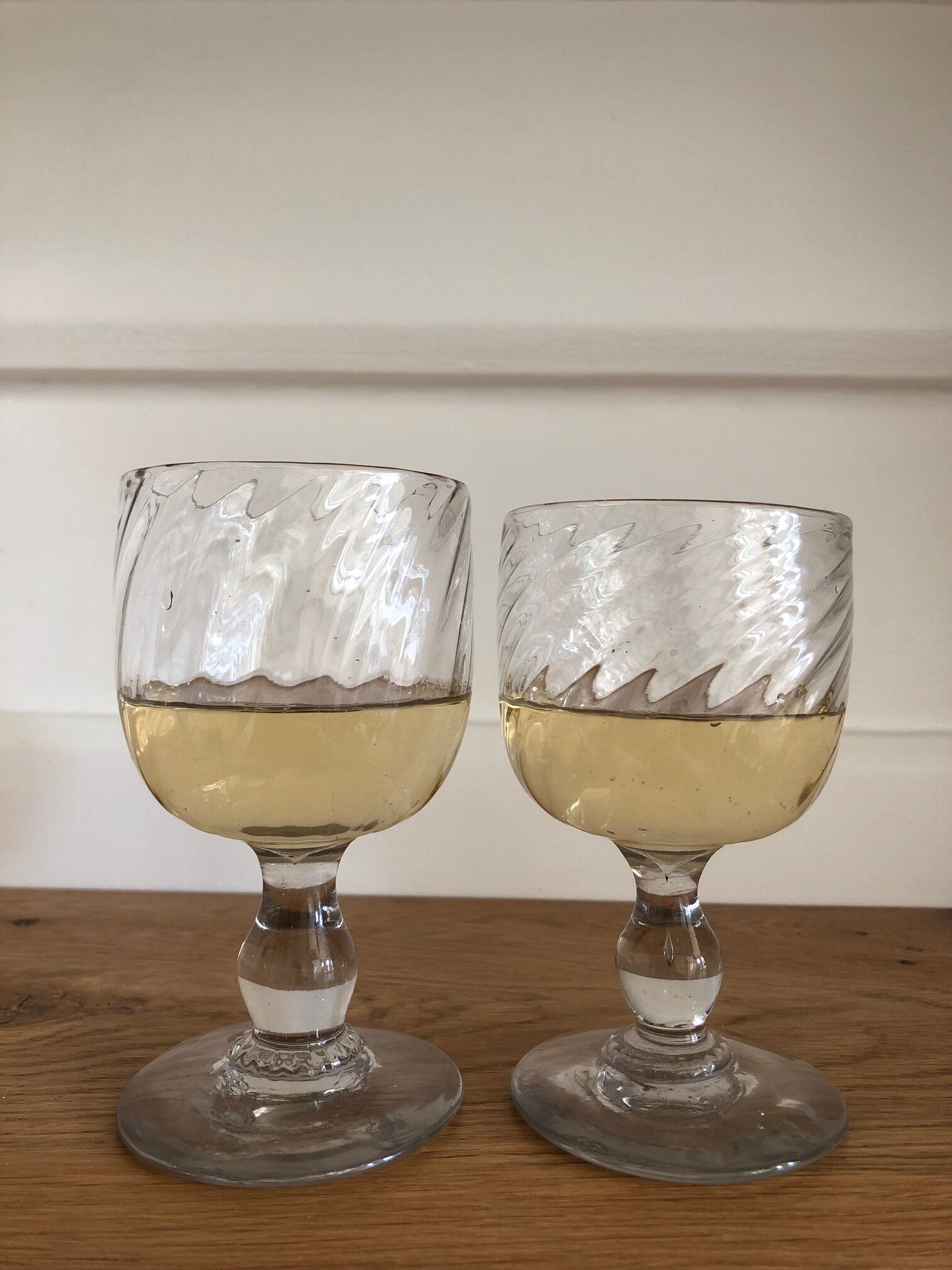 Two old wine glasses, torsaded, blown glass, France - late 19th century