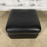 Black leather pouf