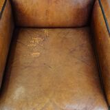 Set of 2 stylish yet comfortable armchairs made of sheepskin leather with a sleek design