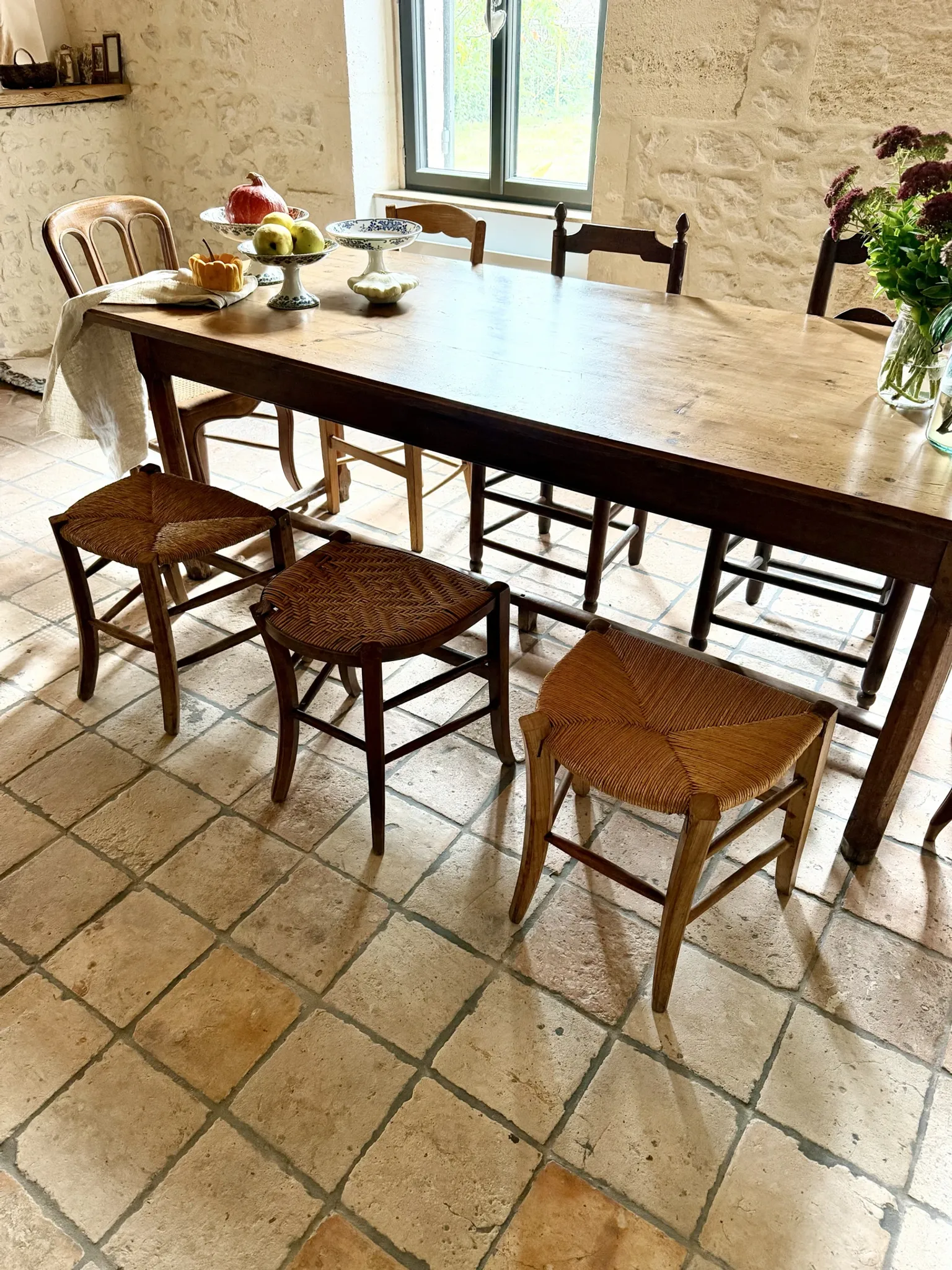 Campaign stool in rattan and wood