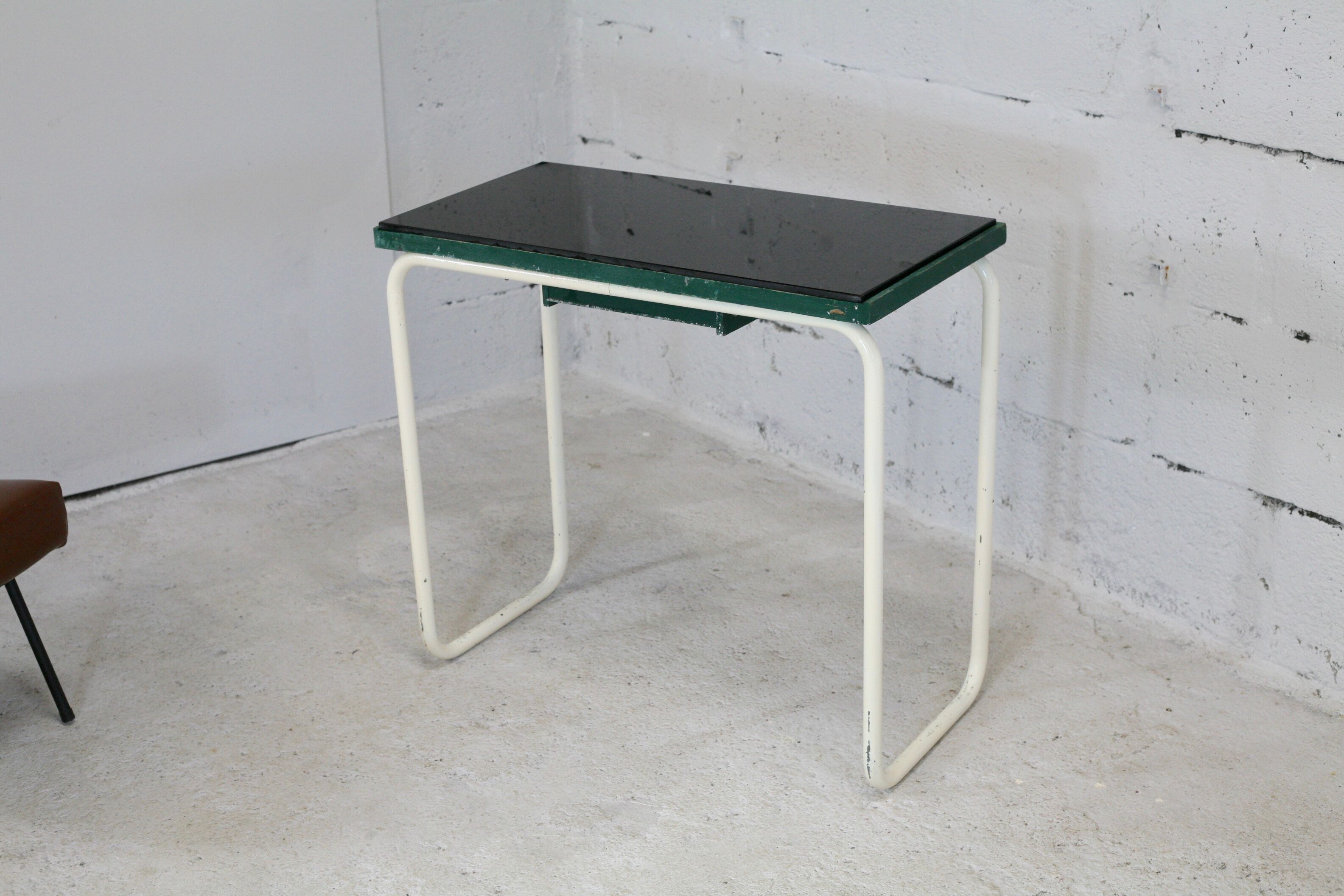 Tubular steel console, black glass tray, circa 1950