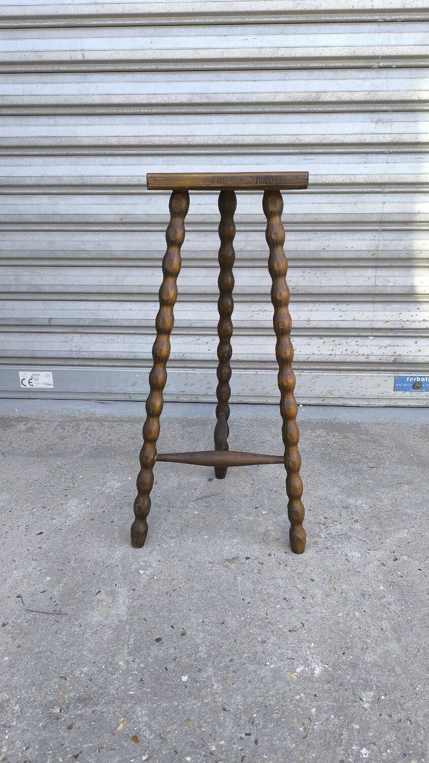 Turned wooden tripod stool