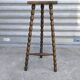 Turned wooden tripod stool