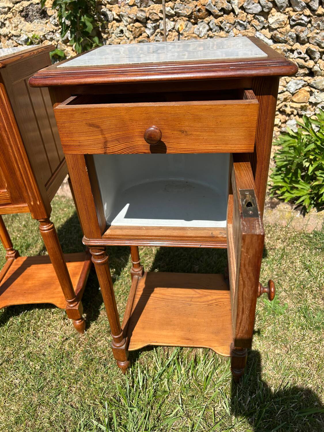 Pair of wooden and white marble bedside tables circa 1900