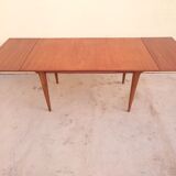 Scandinavian table in teak with  extensions