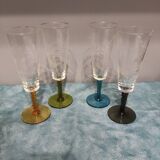 Four vintage stemmed glasses