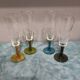 Four vintage stemmed glasses