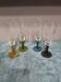 Four vintage stemmed glasses