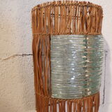Glass and rattan sconce