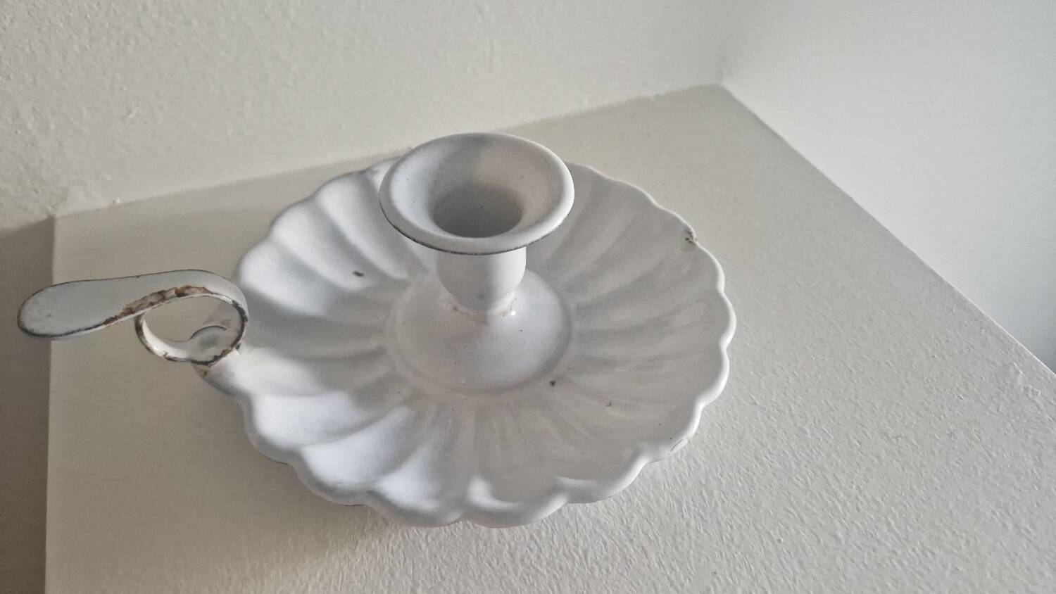 Enameled sheet metal candlestick holder