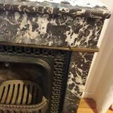 Old black marble fireplace