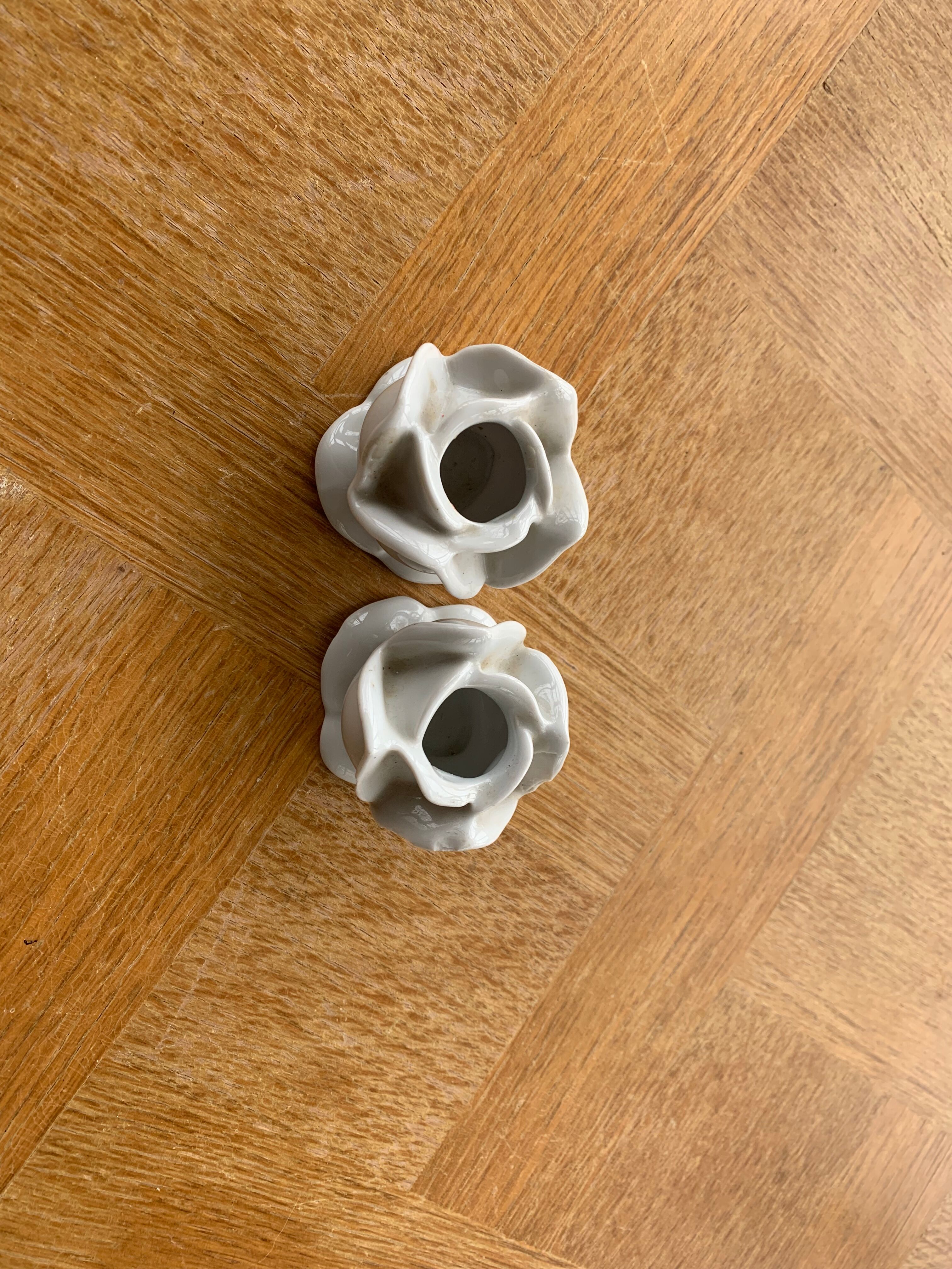 Two vintage white porcelain flower candle holders