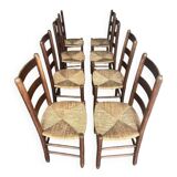 Set of 8 wooden chairs with rattan seats from the 1950s