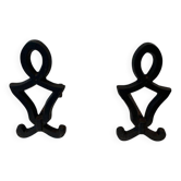Pair of Cast Iron Chenets with Figurative Anthropomorphic Silhouette, by Raymon