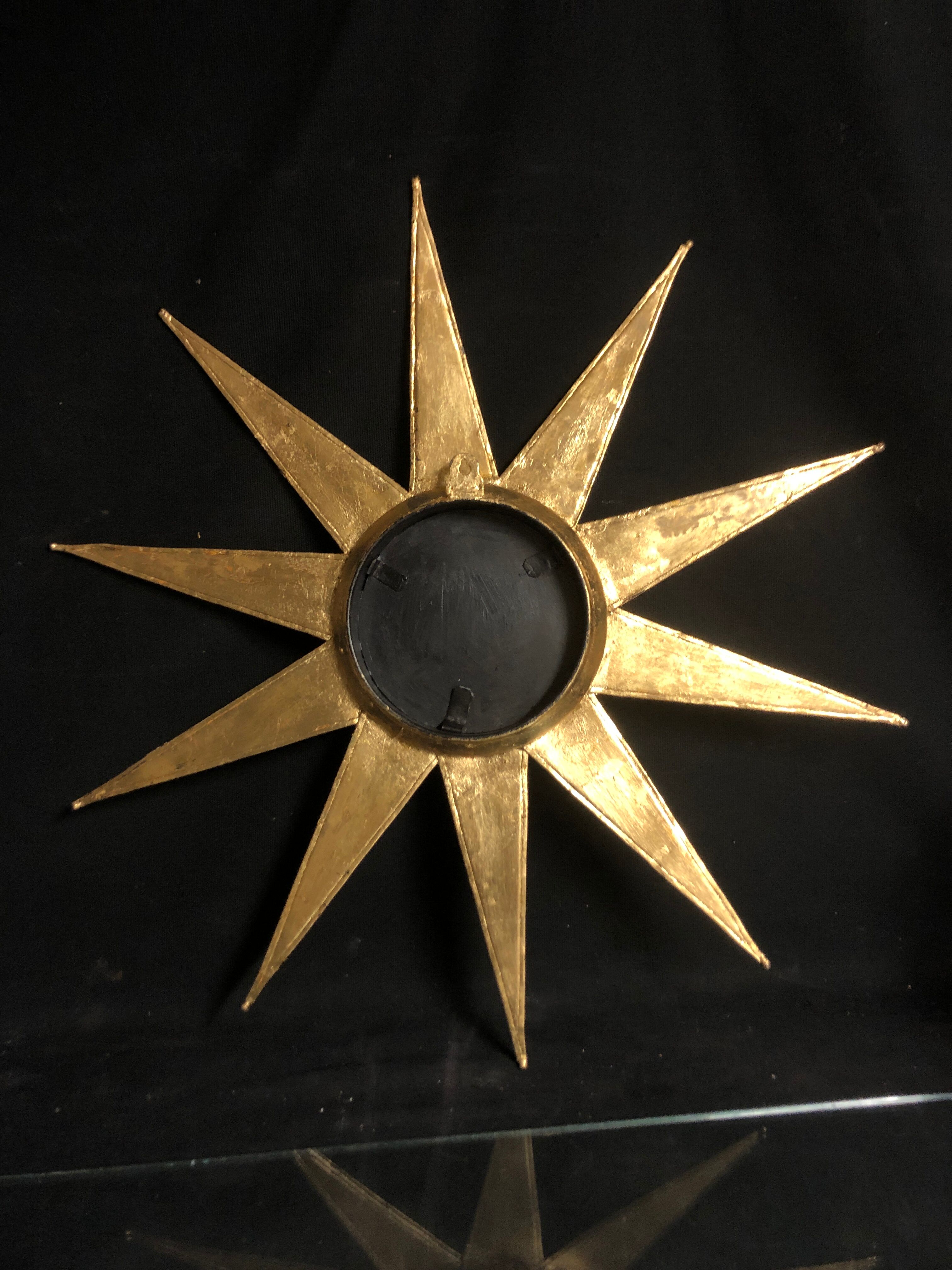 Mirror sun deforming 61 cm in gold metal with gold leaf said witch