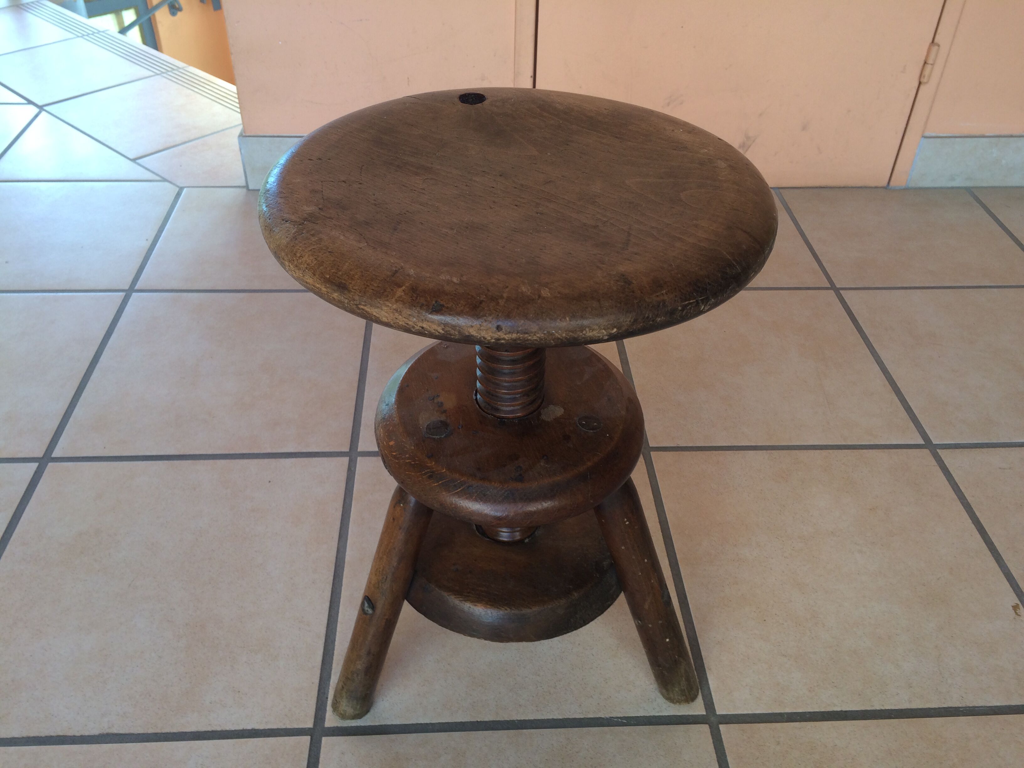 Old solid oak stool adjustable in height 50