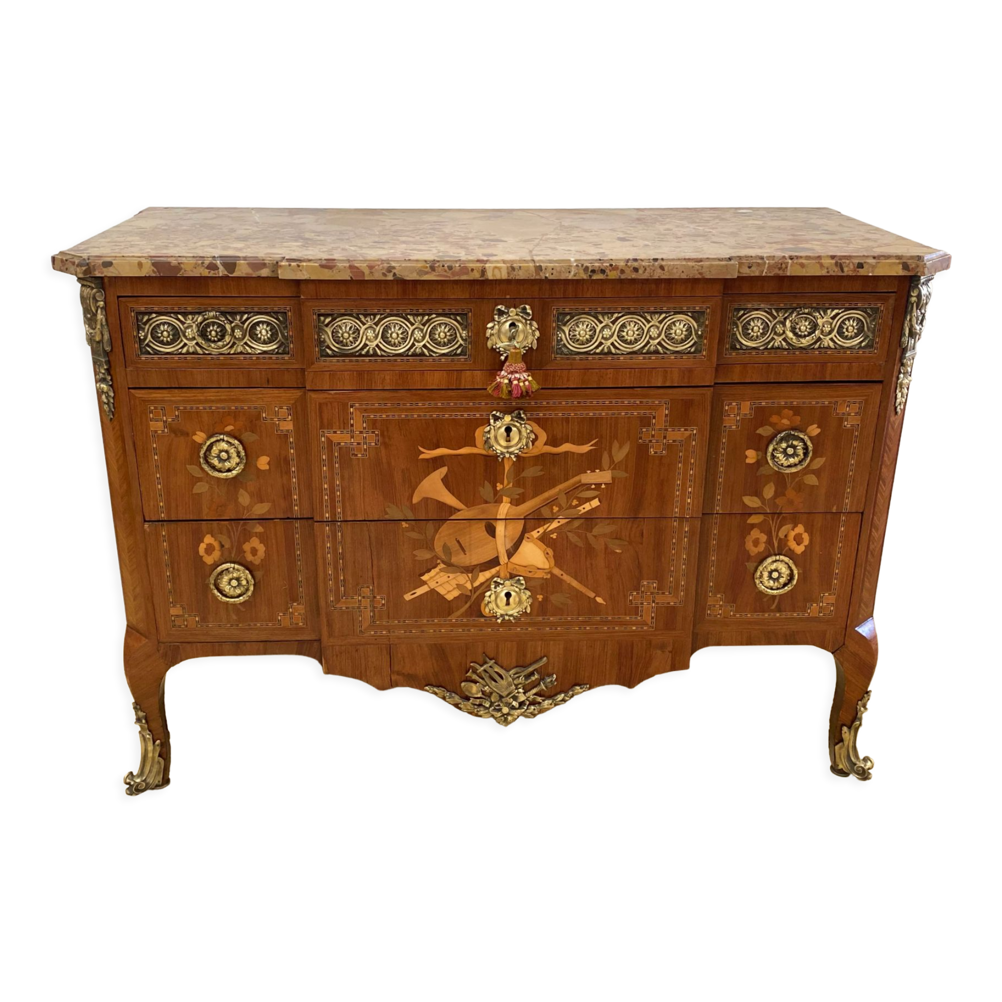 Transition chest of drawers with floral marquetry and music trophy