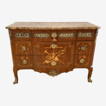 Transition chest of drawers with floral marquetry and music trophy