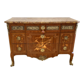 Transition chest of drawers with floral marquetry and music trophy