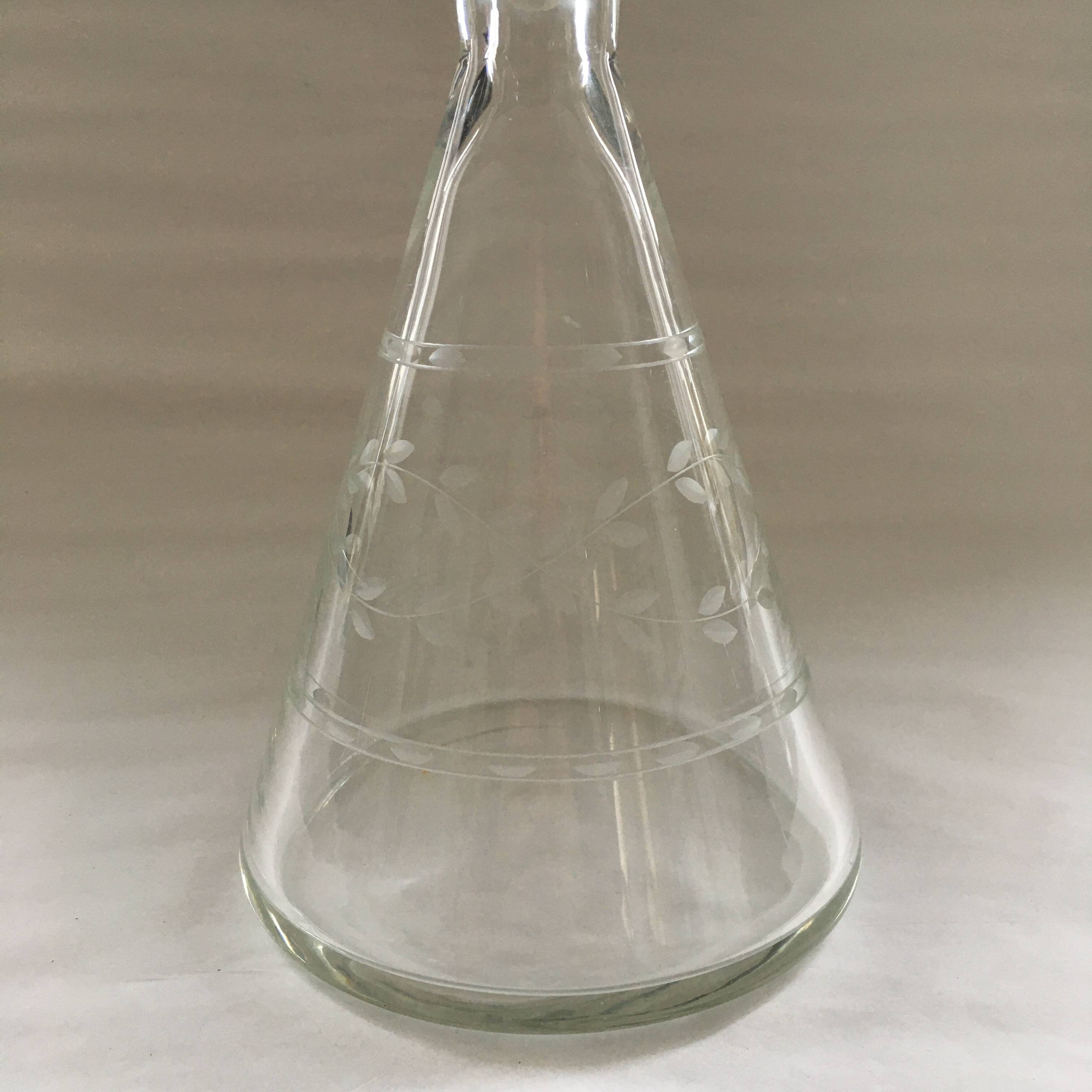 Carafe with chiseled floral decoration