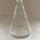 Carafe with chiseled floral decoration