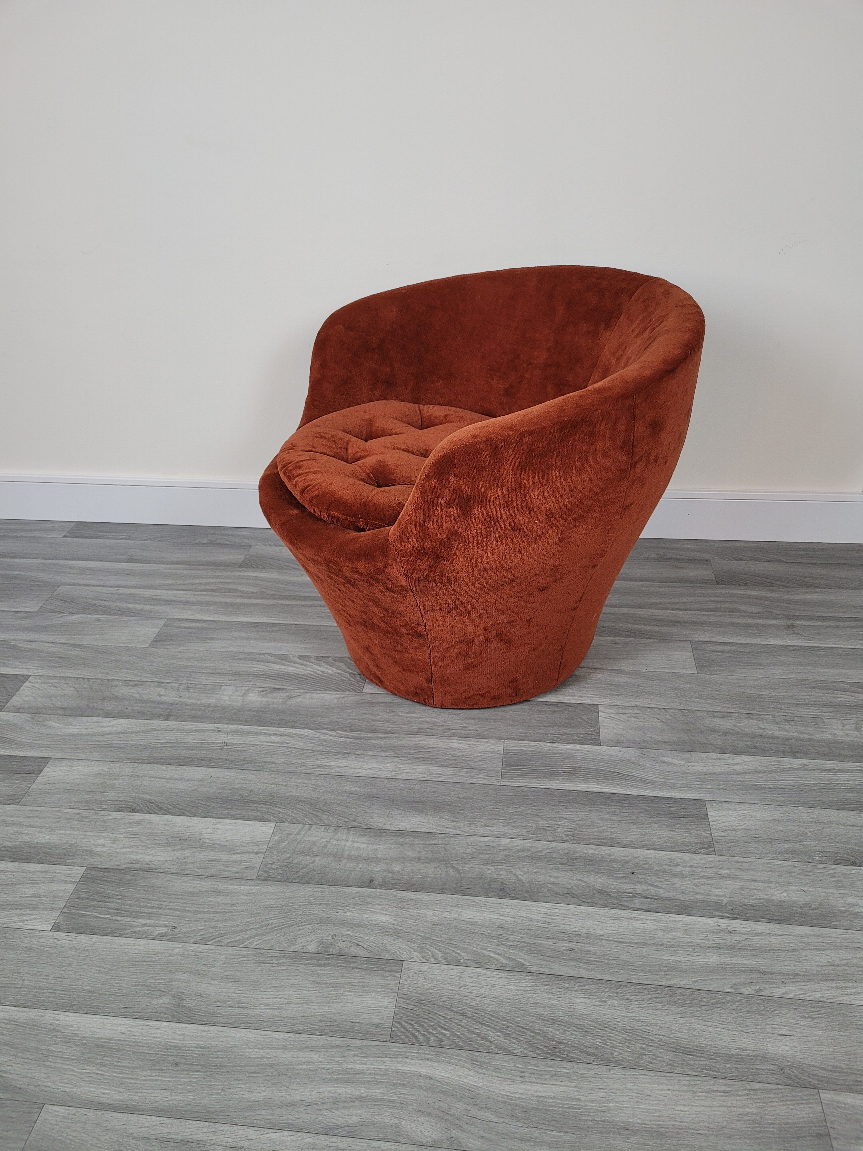 Orange velvet armchair