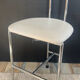 Vintage 70s chair in chrome metal and white faux leather.