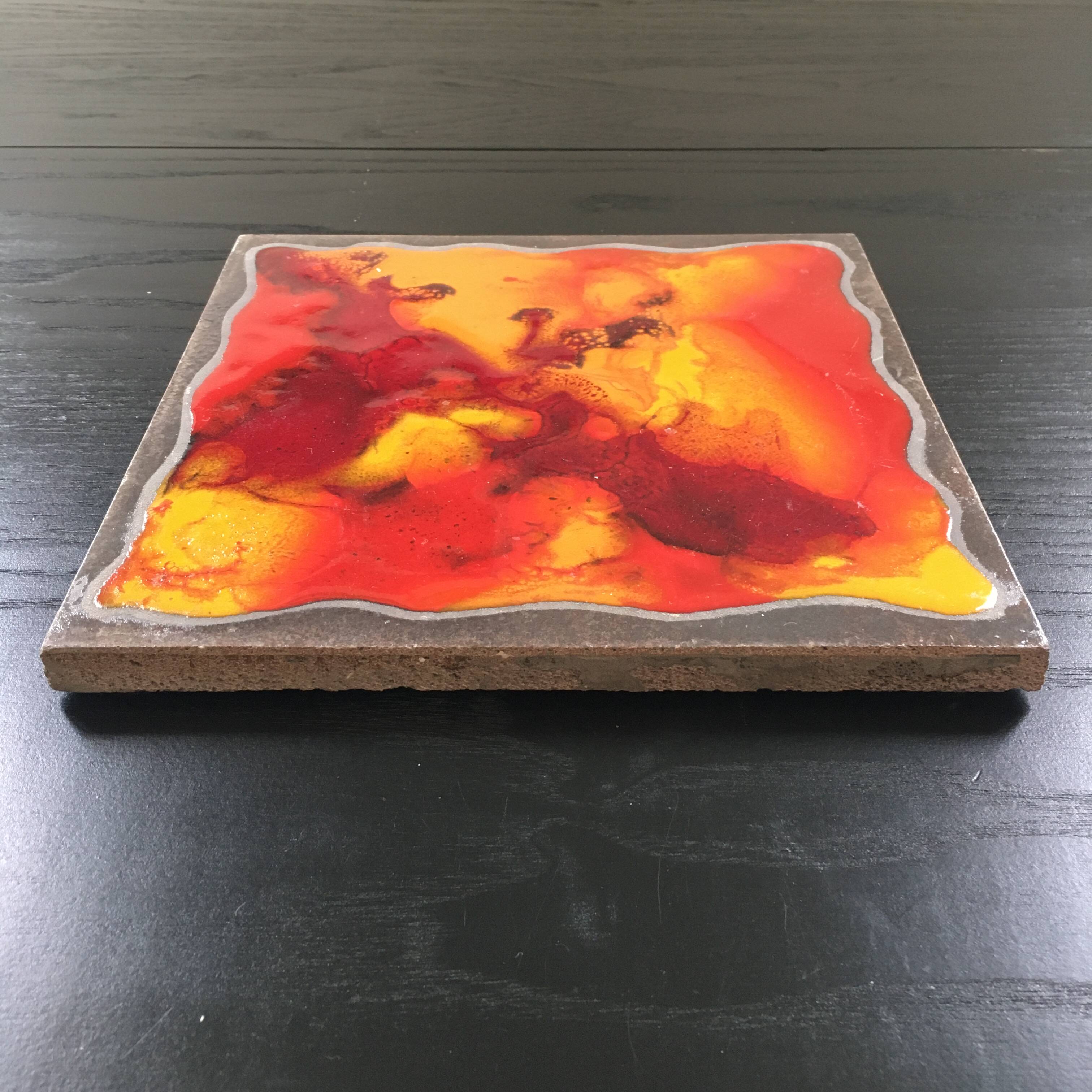 Enamelled lava trivet