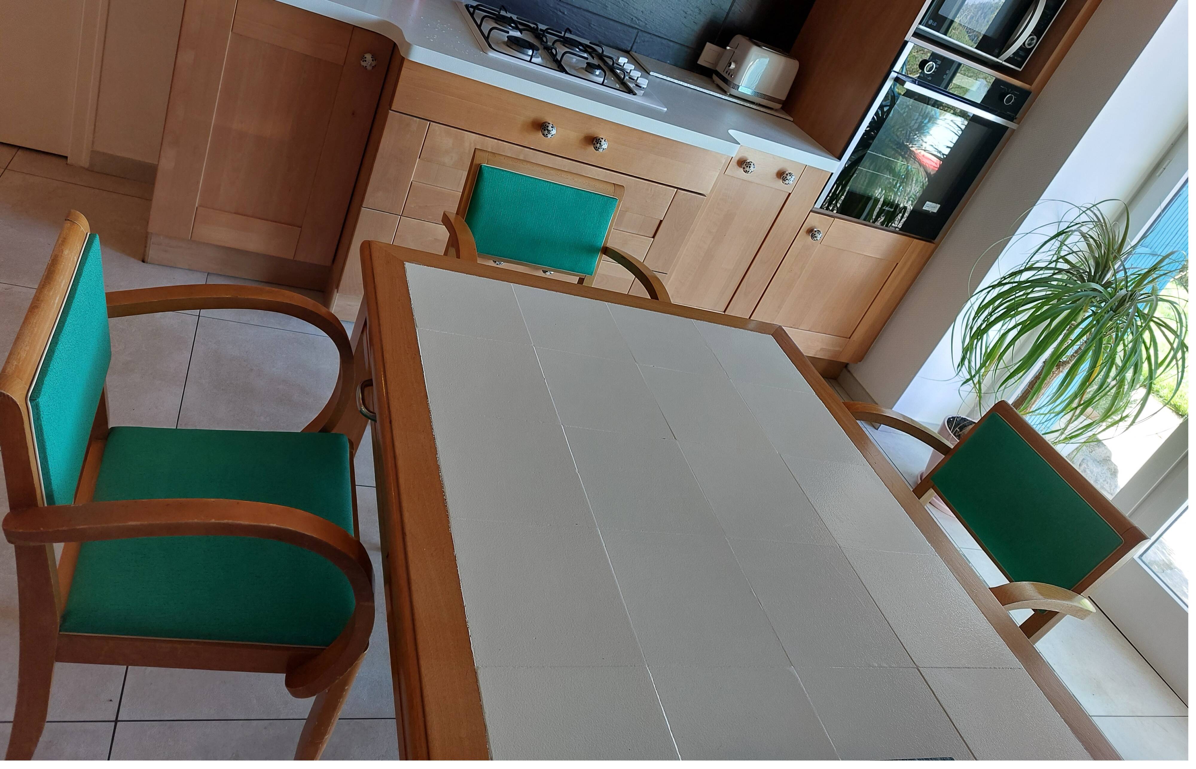 3 vintage bridge chairs with rounded armrests.