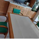 3 vintage bridge chairs with rounded armrests.