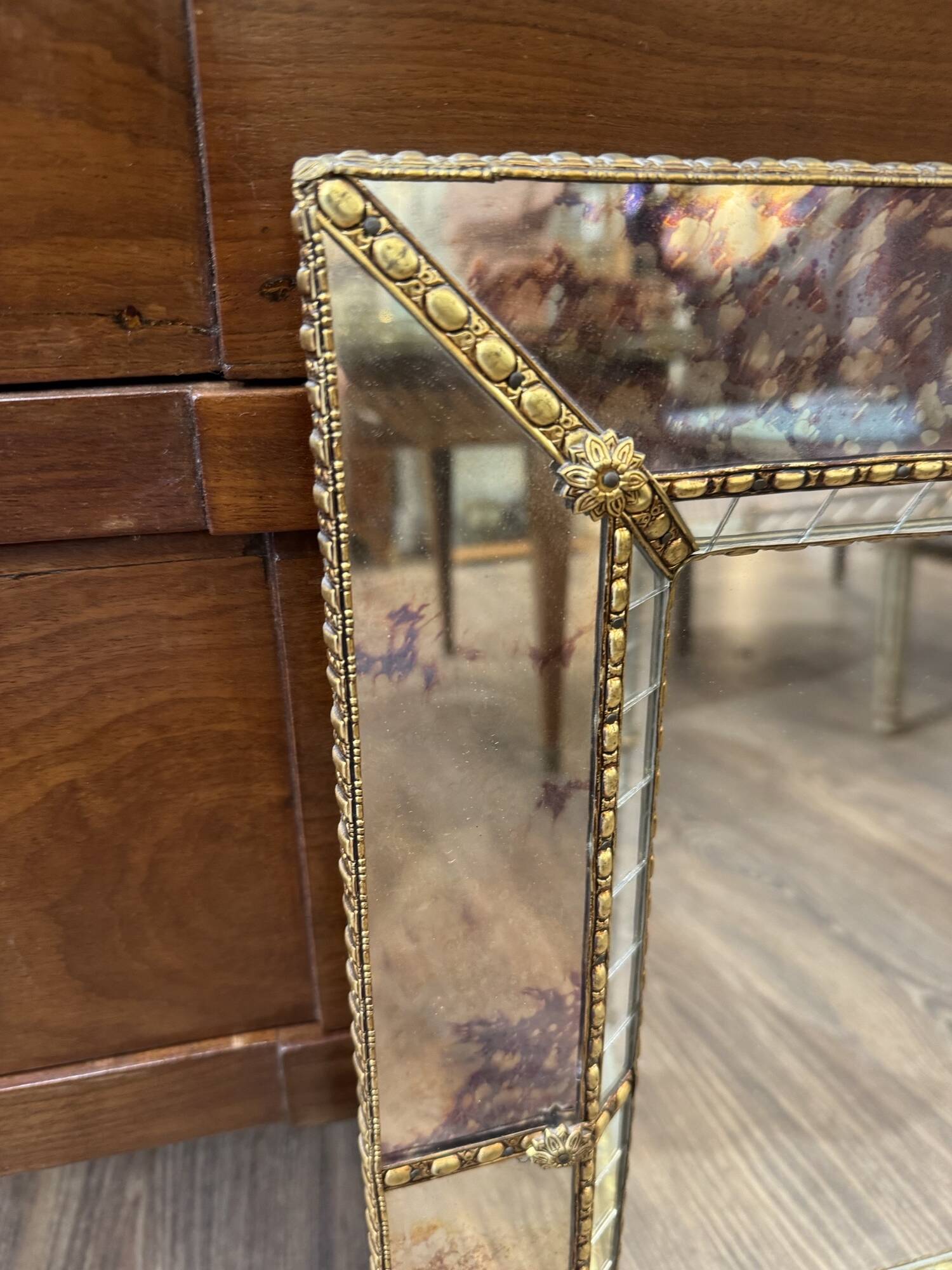 Vintage Venetian mirror with a frame from around 1970.
