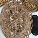 Wall composition of seven baskets and wicker trays