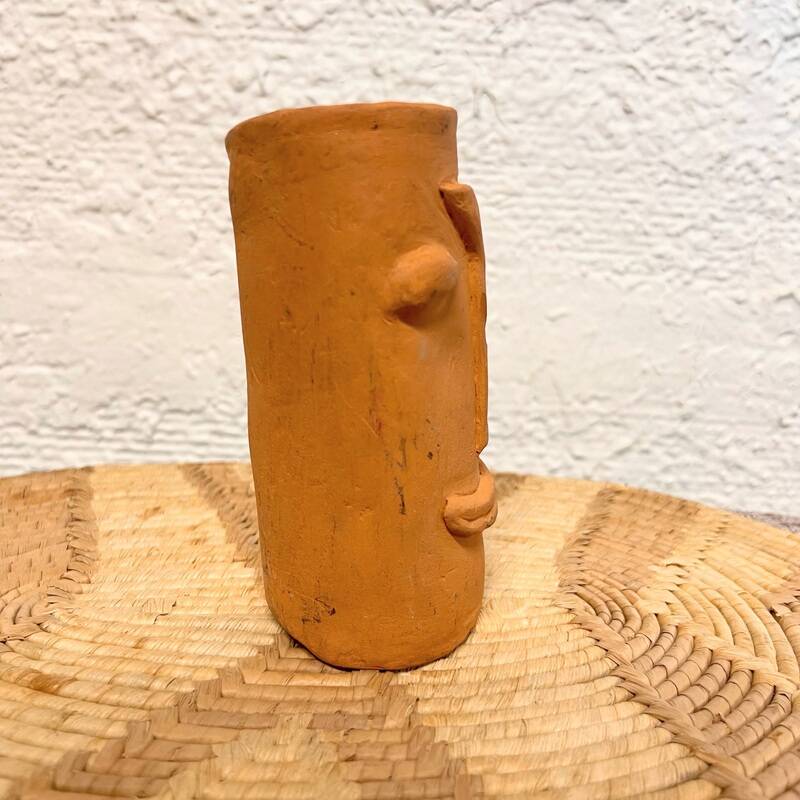 Face terracotta vase