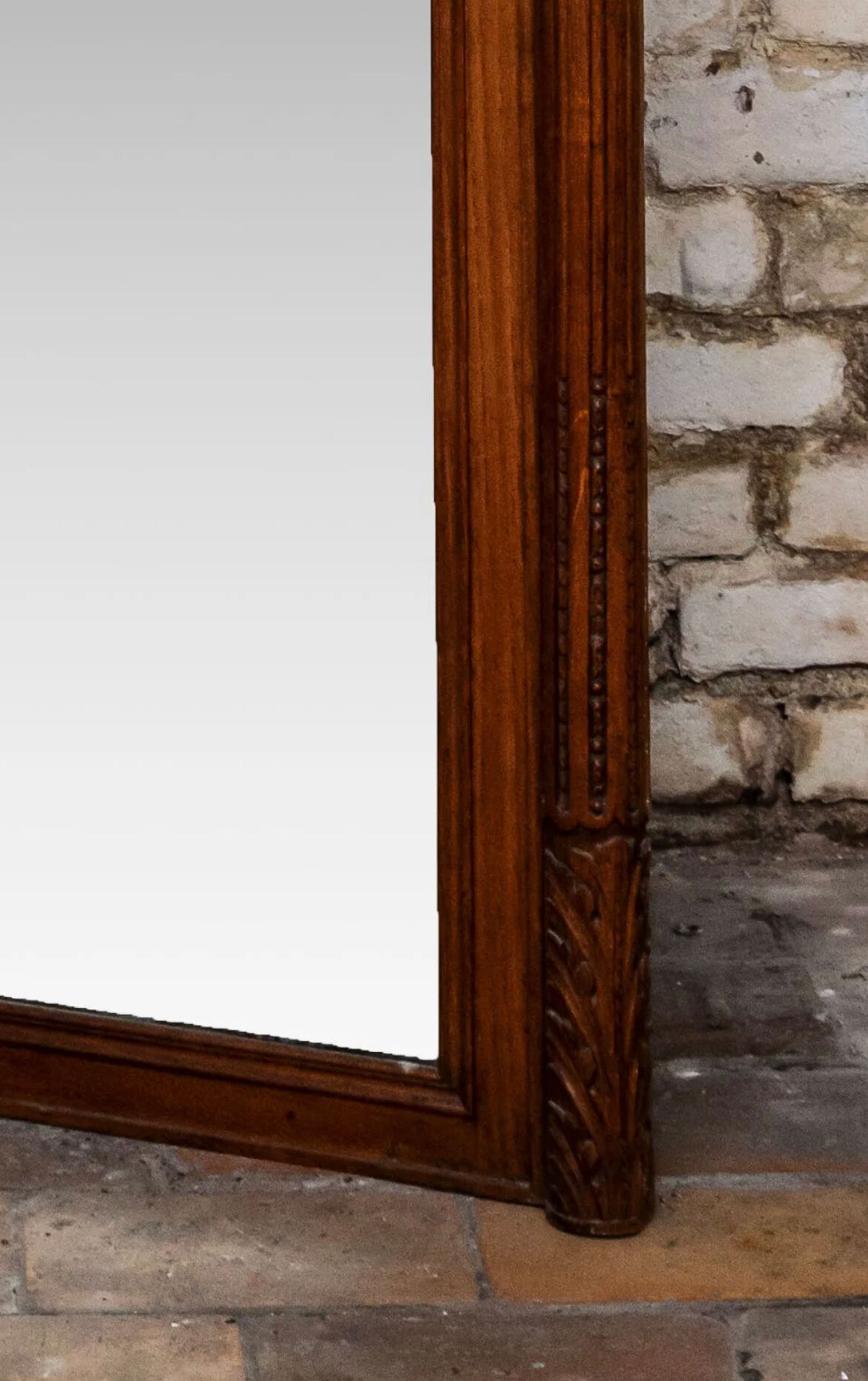 Beveled mirror in carved oak early twentieth century