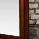 Miroir biseauté en chêne sculpté début XXème