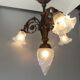 Art nouveau chandelier in bronze and pressed glass 1920