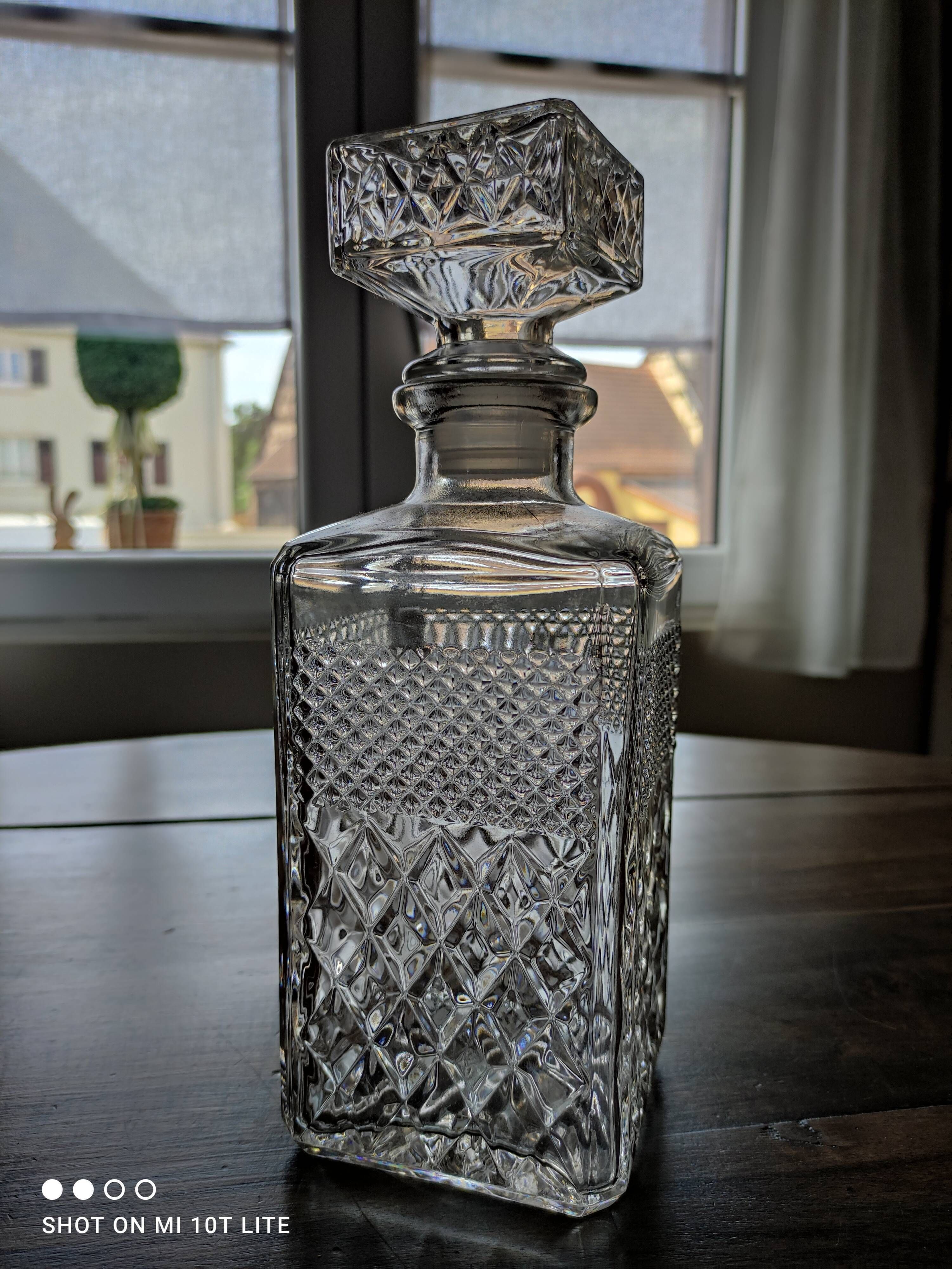 Vintage diamond-faceted glass whisky decanter